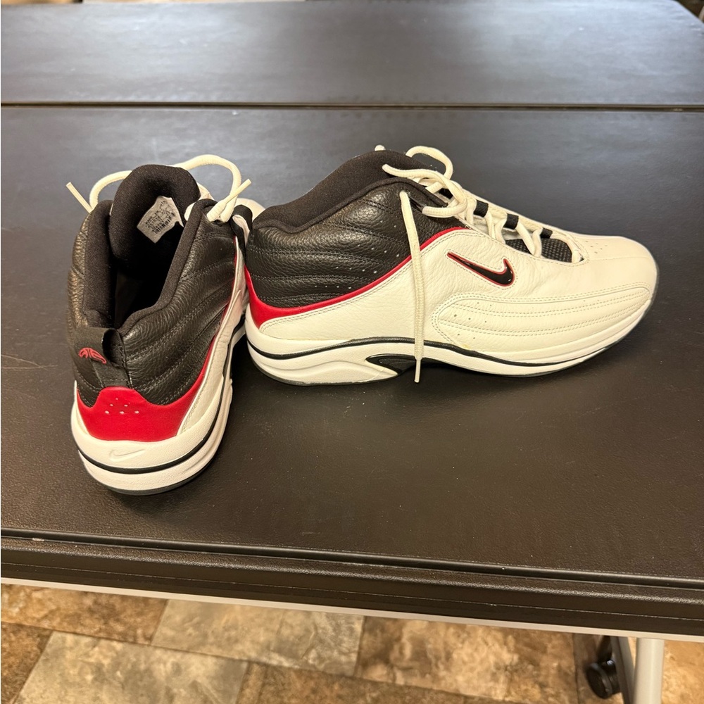 Nike Black and White Athletic Shoes with Red Accents